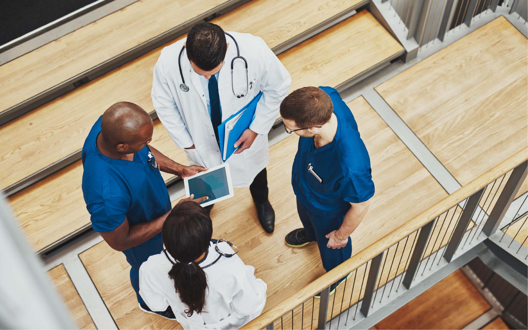 Group of medical professionals on staircase